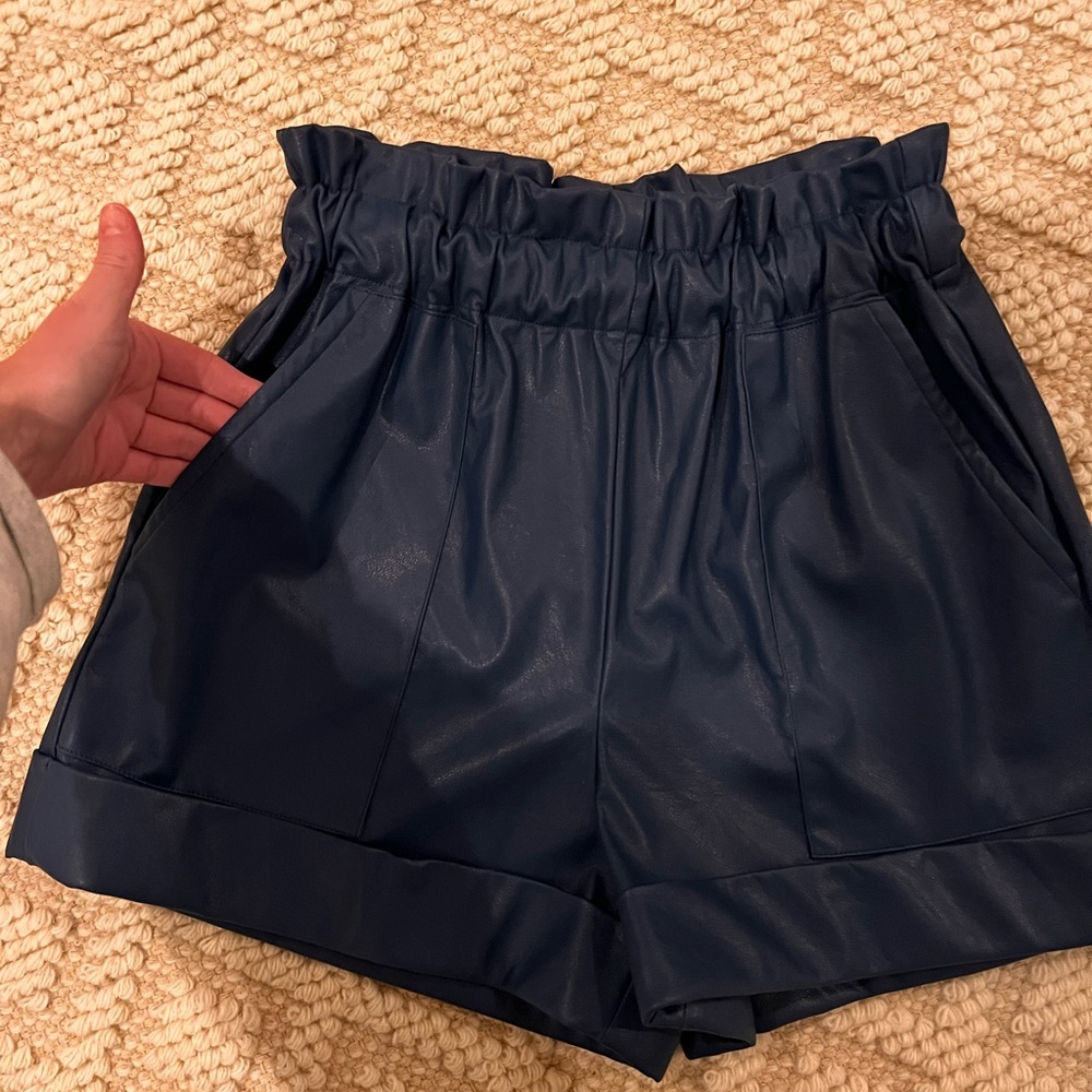 Lavender brown pleather shorts. NWT